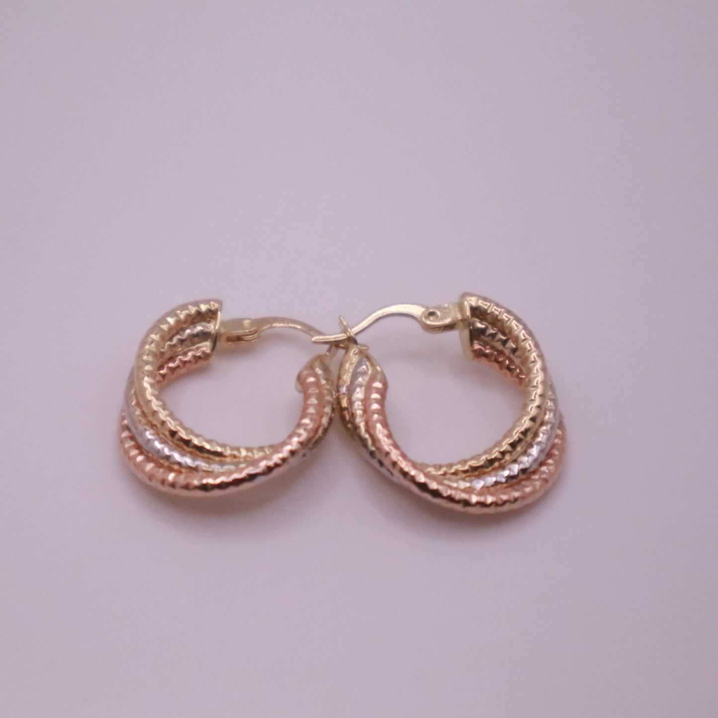 14k Gold textured and twisted hoops earrings 25mm
