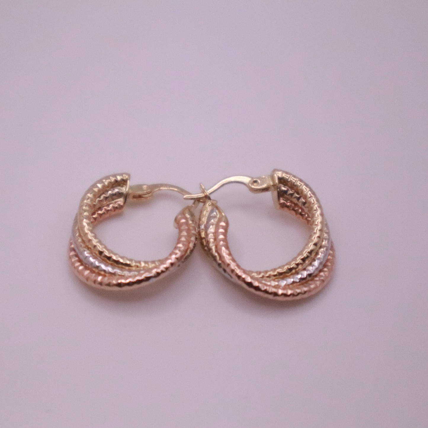 14k Gold textured and twisted hoops earrings 25mm
