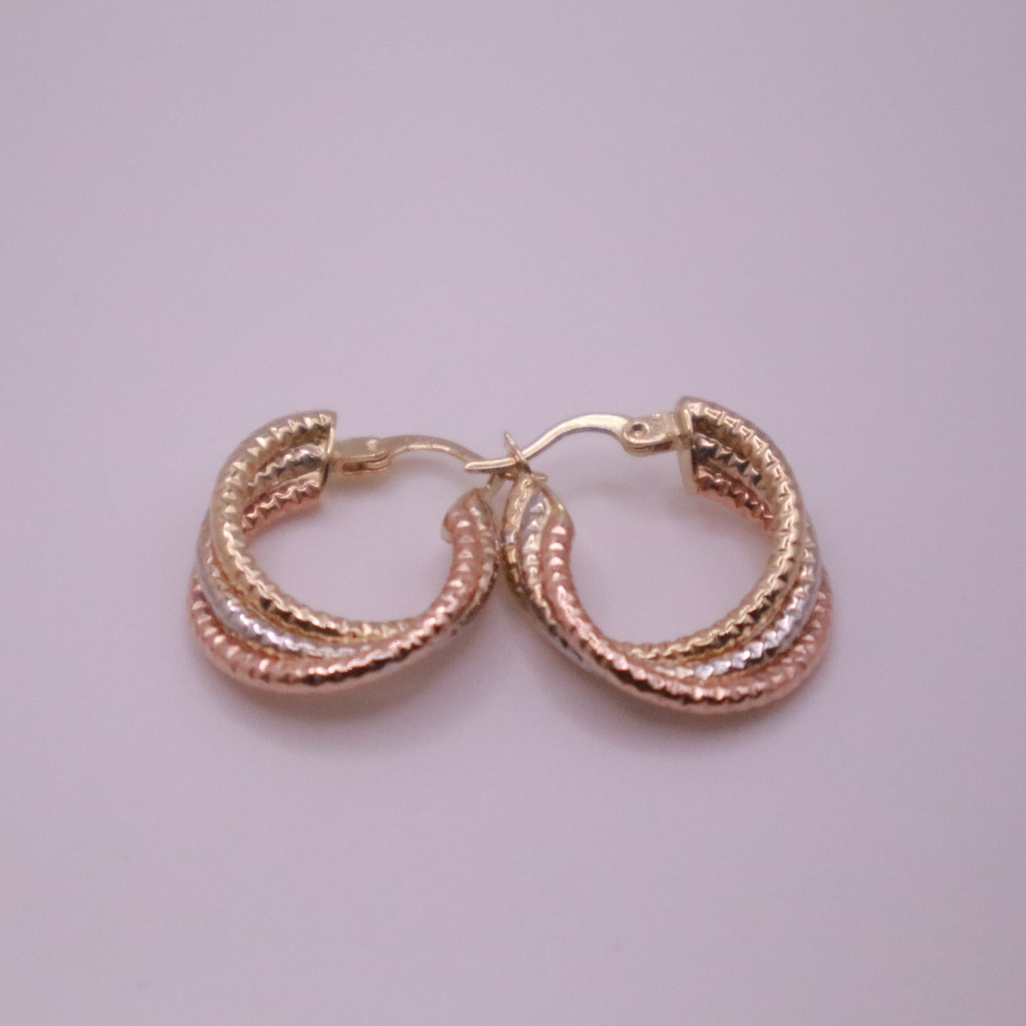14k Gold textured and twisted hoops earrings 25mm