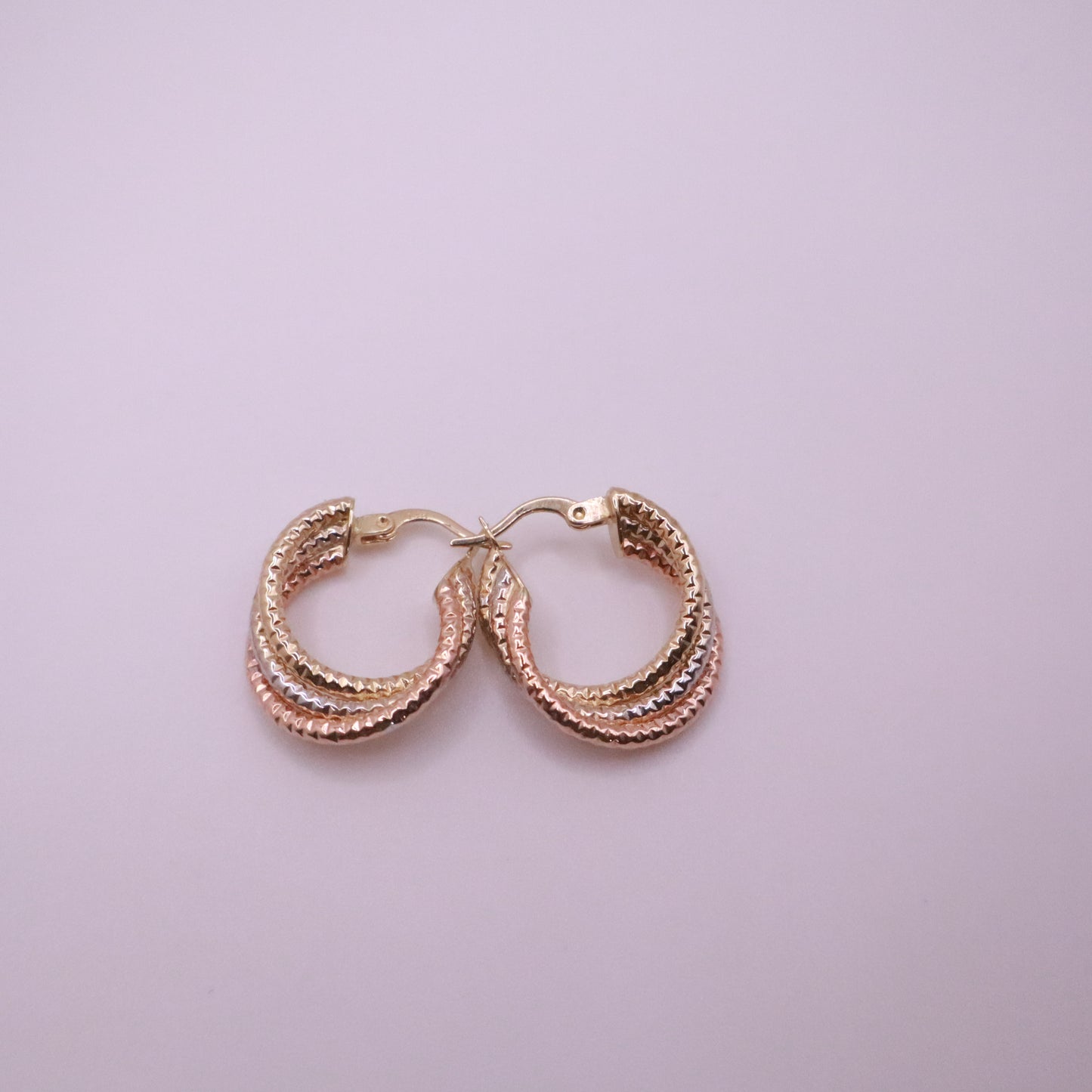 14k Gold textured and twisted hoops earrings 25mm